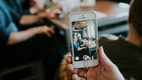 Creator scrolling past a lengthy brand brief on phone
